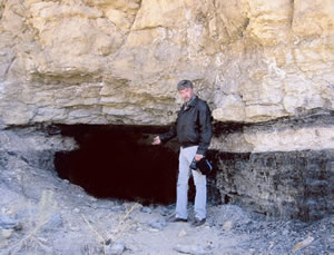Tom Clark standing in front the original mine